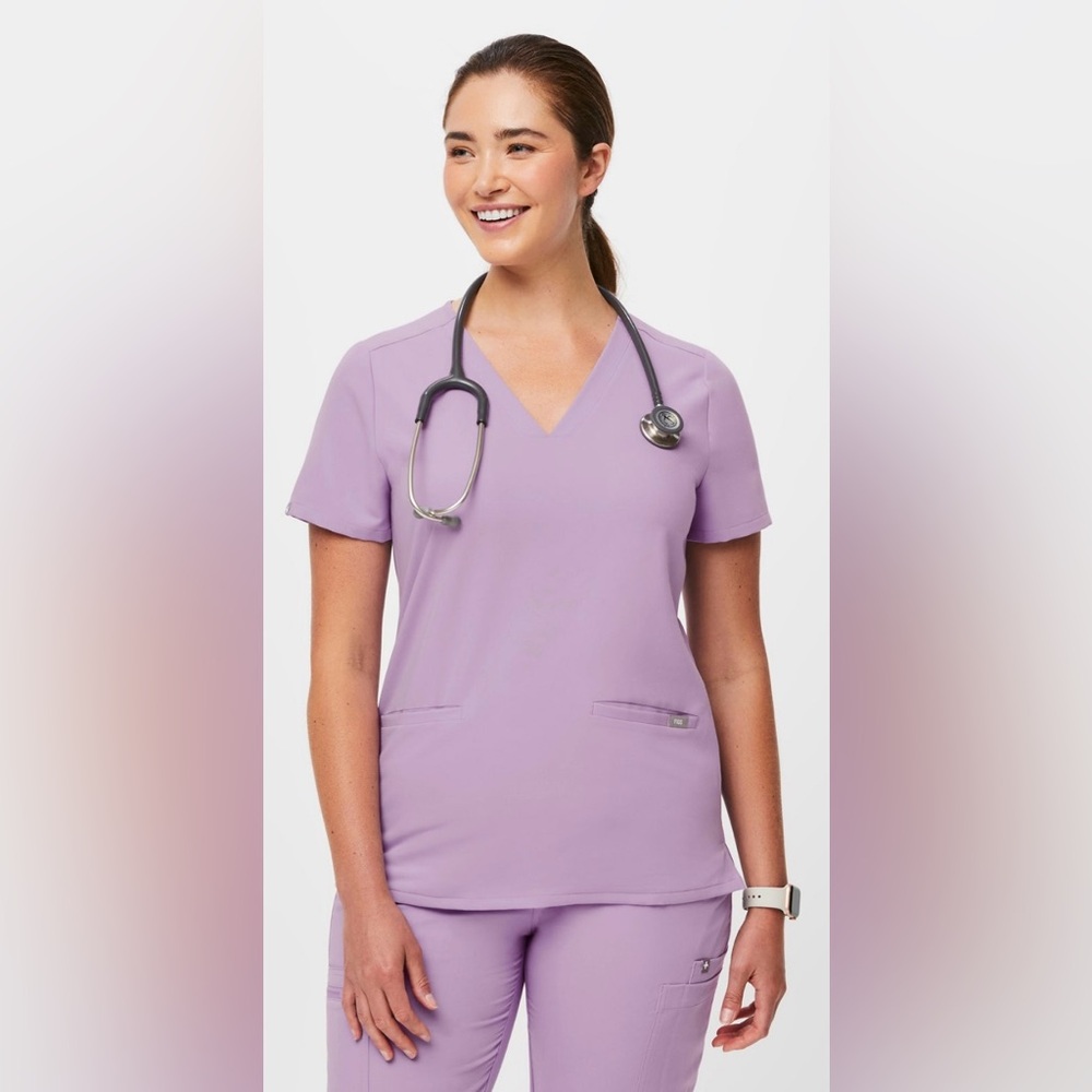 Figs three pocket scrub top.  Size small.  Color is Lavender.  NWOT!